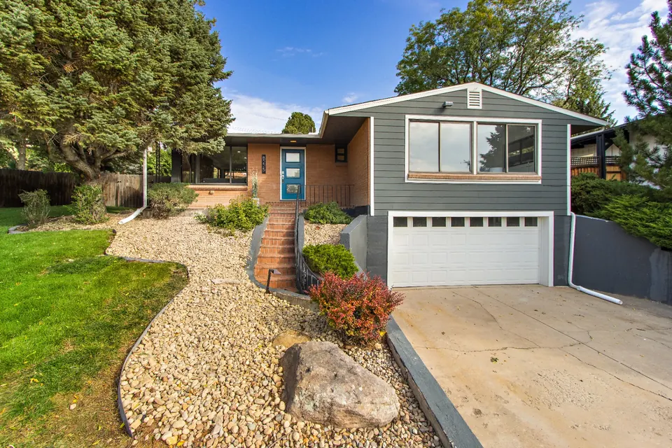 Renovated home exterior with landscaped front walk, Arvada, CO